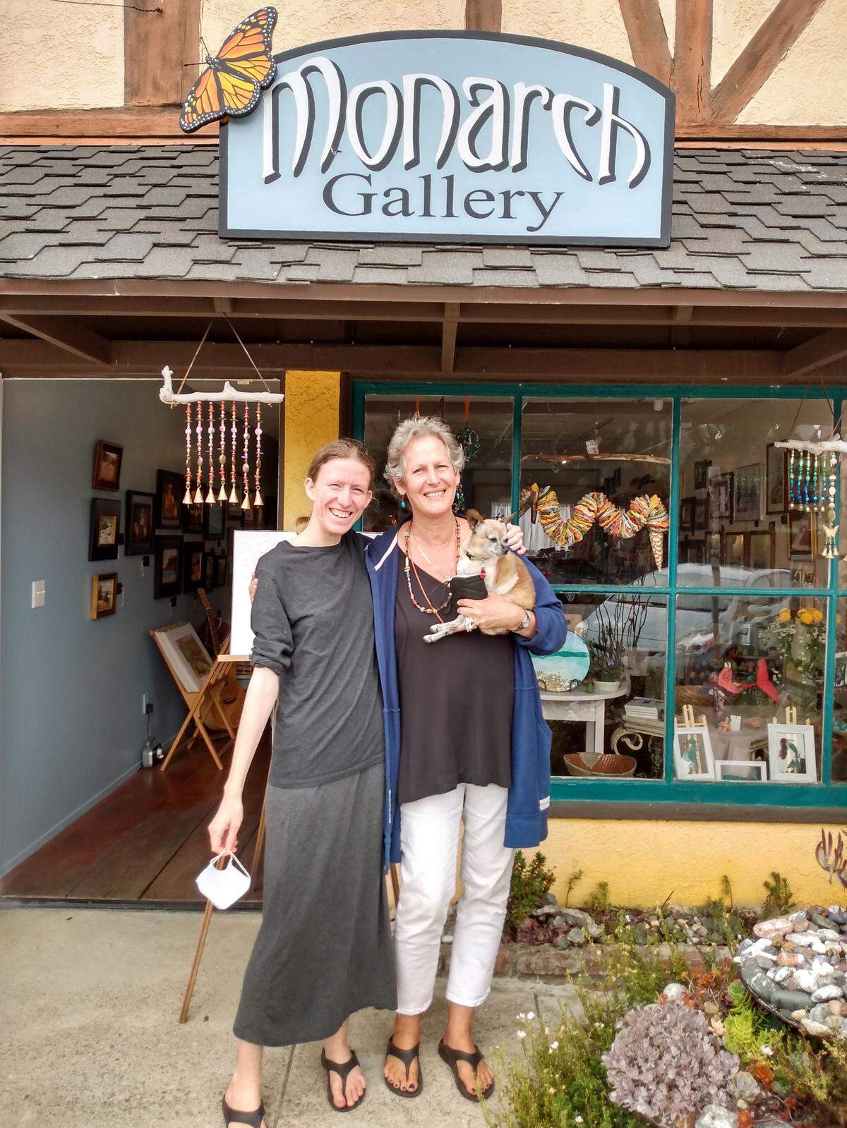 Daughter and mother, Natalie and Leslie Marks, created a new joint venture: the Monarch Gallery in Cambria. The latter (who is holding their pet, Tiny) is perhaps best known in the area for the children’s shop she launched and owned for years, Froggies.
