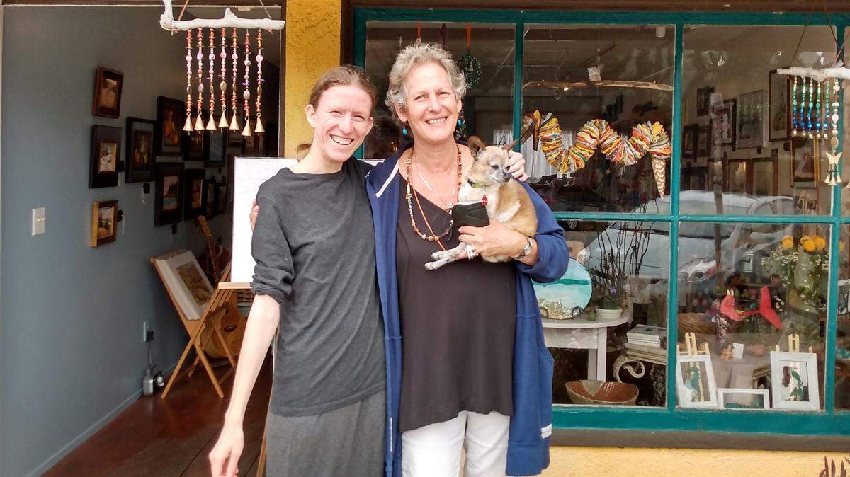 Daughter and mother Natalie and Leslie Marks have created a new joint venture: the Monarch Gallery in Cambria. The latter, who is holding their pet, Tiny, is perhaps best known in the area for the children’s shop she launched and owned for years, Froggies.