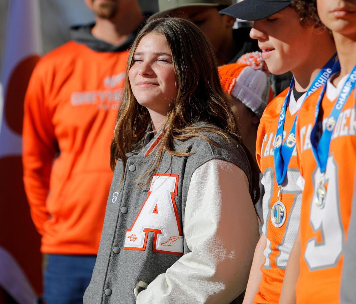 Atascadero cross country runner Frannie Perry and the Greyhound football team were celebrated with a parade through downtown on Wednesday, Dec. 21, 2022. Perry won the CIF Division 3 cross country championship for the 5,000 meters while the football team won the Division 6-A state finals.