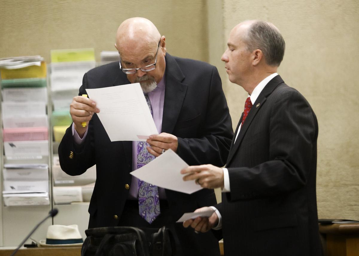 San Luis Obispo County District Attorney Dan Dow, right, confers with defense attorney Ilan Funke-Bilu before the start of the preliminary hearing for Herbert George Connor, 72, of Cambria, on June 26.