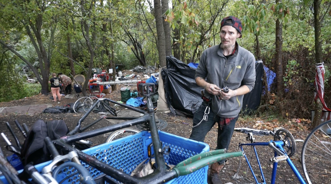 Wolf Boone, a resident of a homeless camp near Los Osos Valley Road off the Bob Jones Trail, prepares to move his possessions before San Luis Obispo police clear the camp out. Residents were ordered to leave on Monday, Sept. 19, 2022, as the city prepares for flood prevention work.