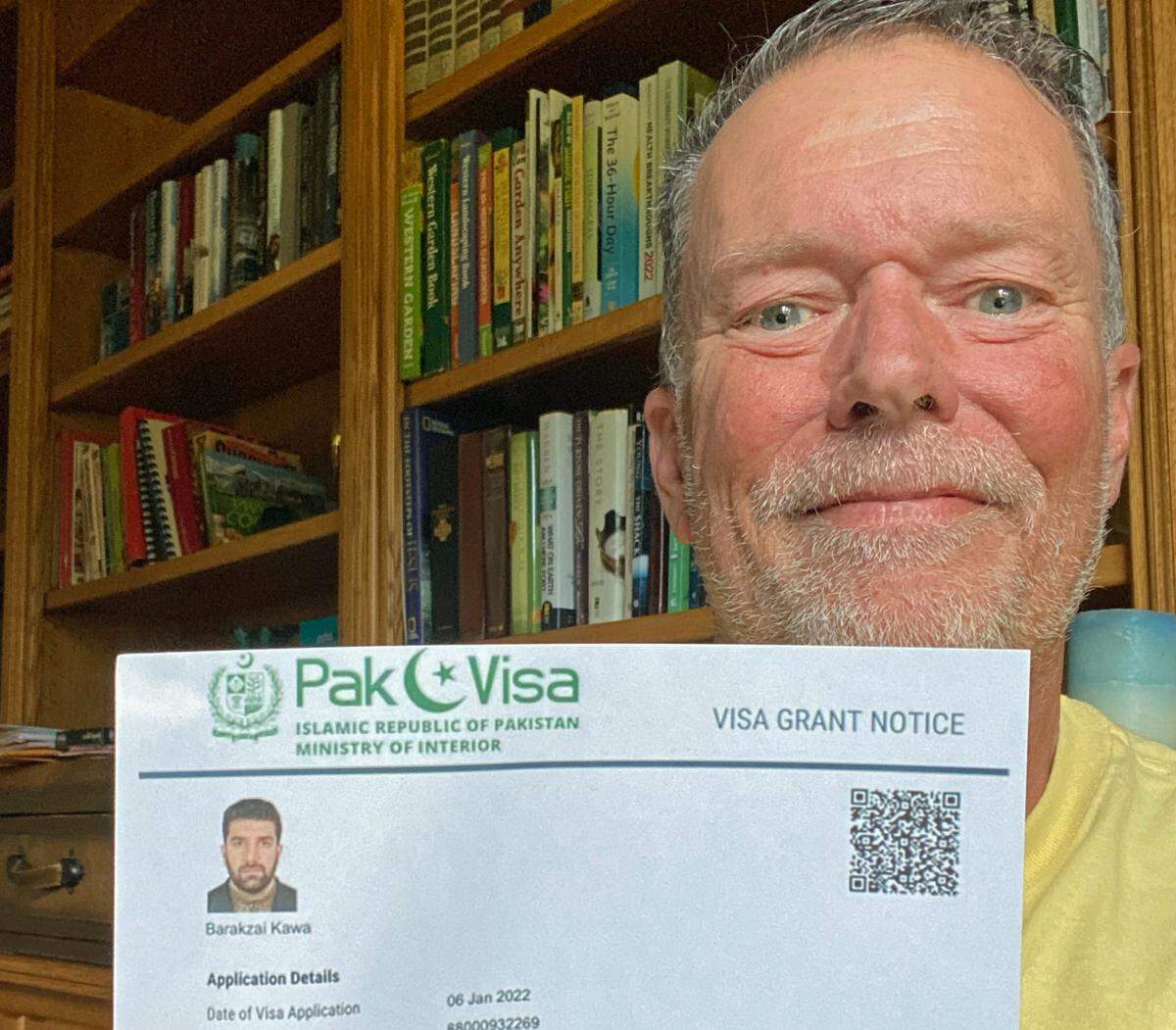 Mike Reeves of Cambria holds a copy of the visa that allowed his friend and colleague, Kawa Barakzai, and his family to finally flee to Pakistan from Afghanistan, where they’d been in hiding for five months since U.S. troops withdrew from the war-torn country. They need to get U.S. visas by March 19, or they’ll have to return to Afghanistan, where they’re certain they’d face being killed. Reeves is among those who’ve been battling to get the family to safety.