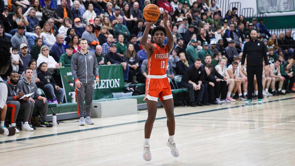 Shea Buckley takes a three-point attempt. Templeton High School pulled away in the final minutes, beating Atascadero in a boys basketball game on Feb. 6, 2024.