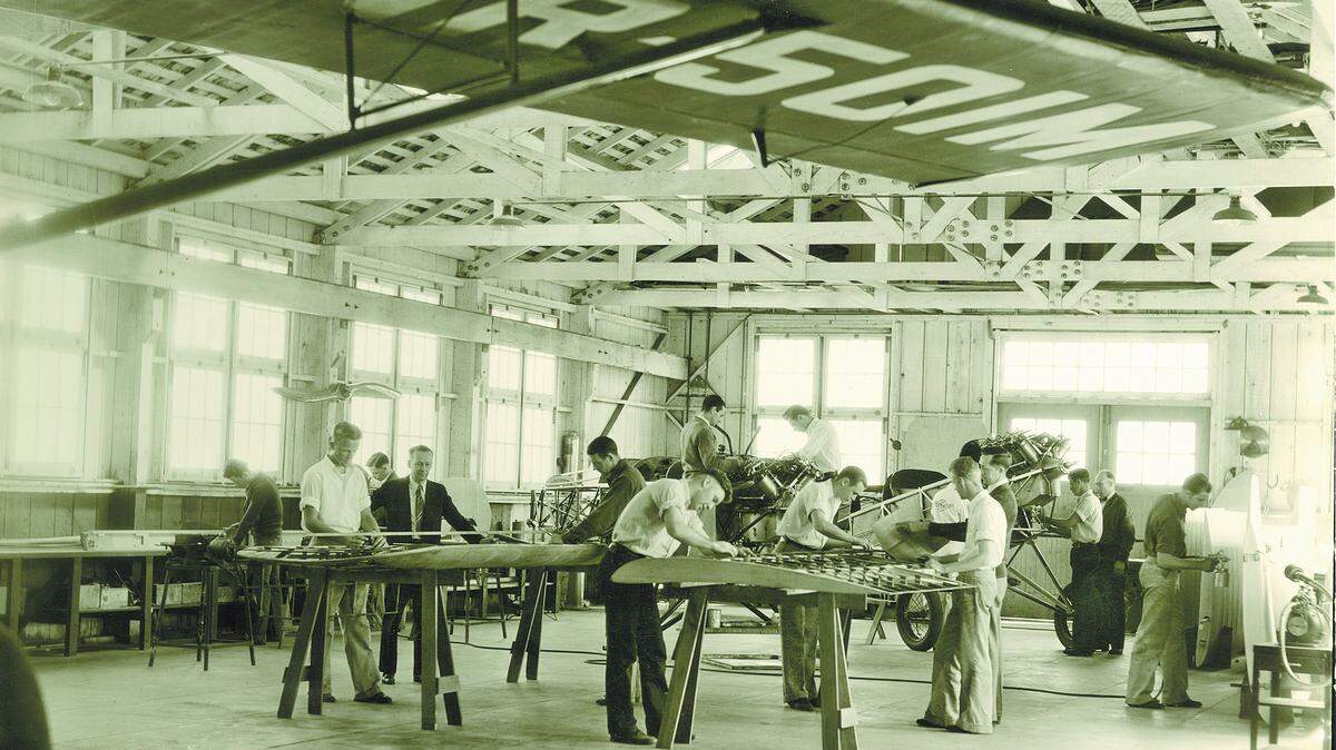 Aeronautics students work in a campus hangar in an undated photo from Cal Poly archives.