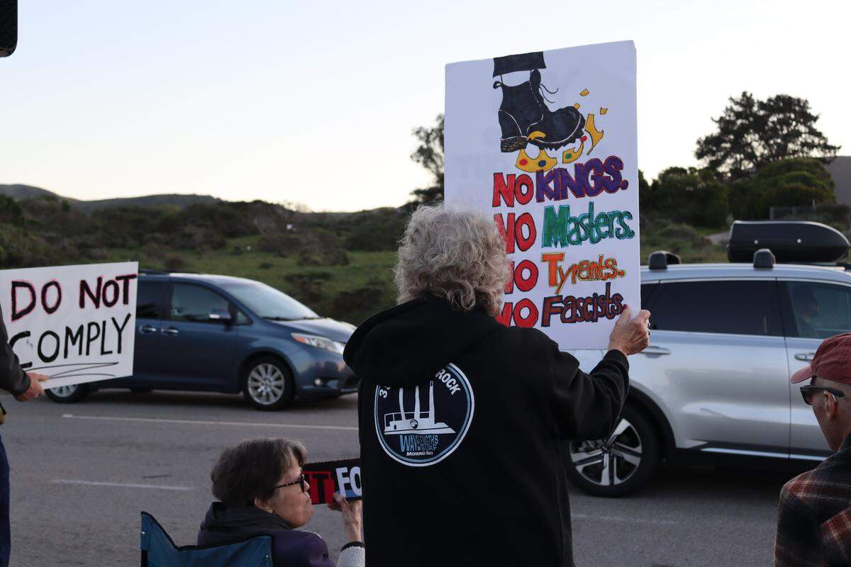 All four corners of Los Osos Valley Road and South Bay Boulevard in Los Osos were taken over by a vigil for Alex Pretti, the second person killed by federal immigration officers in Minneapolis in a month, on Jan. 26, 2026. Attendees honored the Minnesota man’s life and called for accountability from ICE.