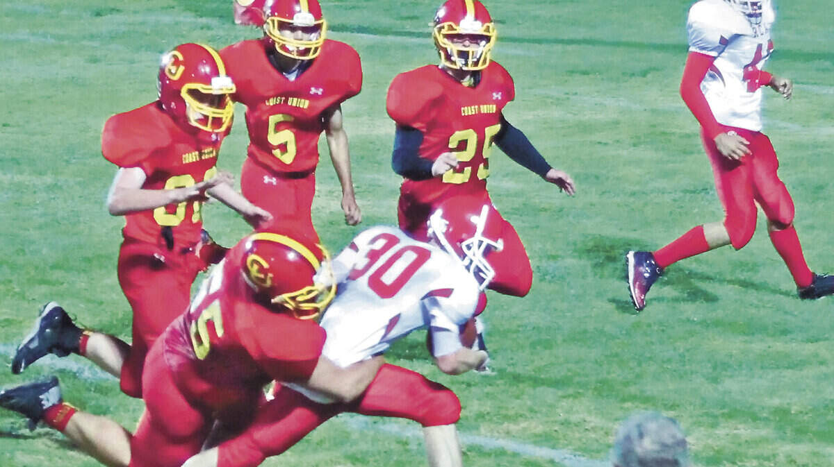 Bronco senior lineman Asher Armstrong led the Broncos with nine tackles Friday night, Oct. 9, against Shandon. Here he tackles a Riverdale runner Oct. 2.