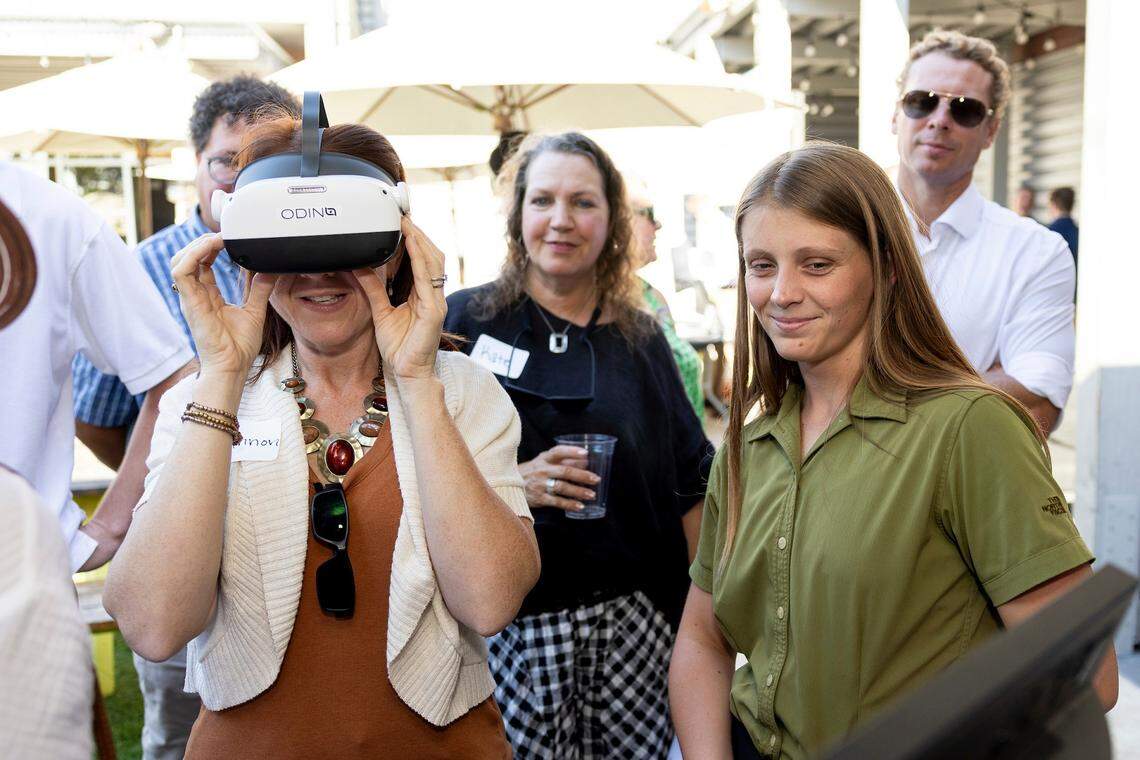Guests watch a demonstration at the Cal Poly Center for Innovation and Entrepreneurship’s annual Demo Day. The ODIN Diagnostics headset designed to detect concussions.