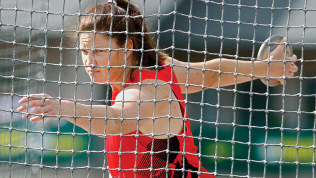 Stephanie Brown Trafton throws during her discus event at the U.S. outdoor track and field championships in Eugene, Ore., in June 2011.