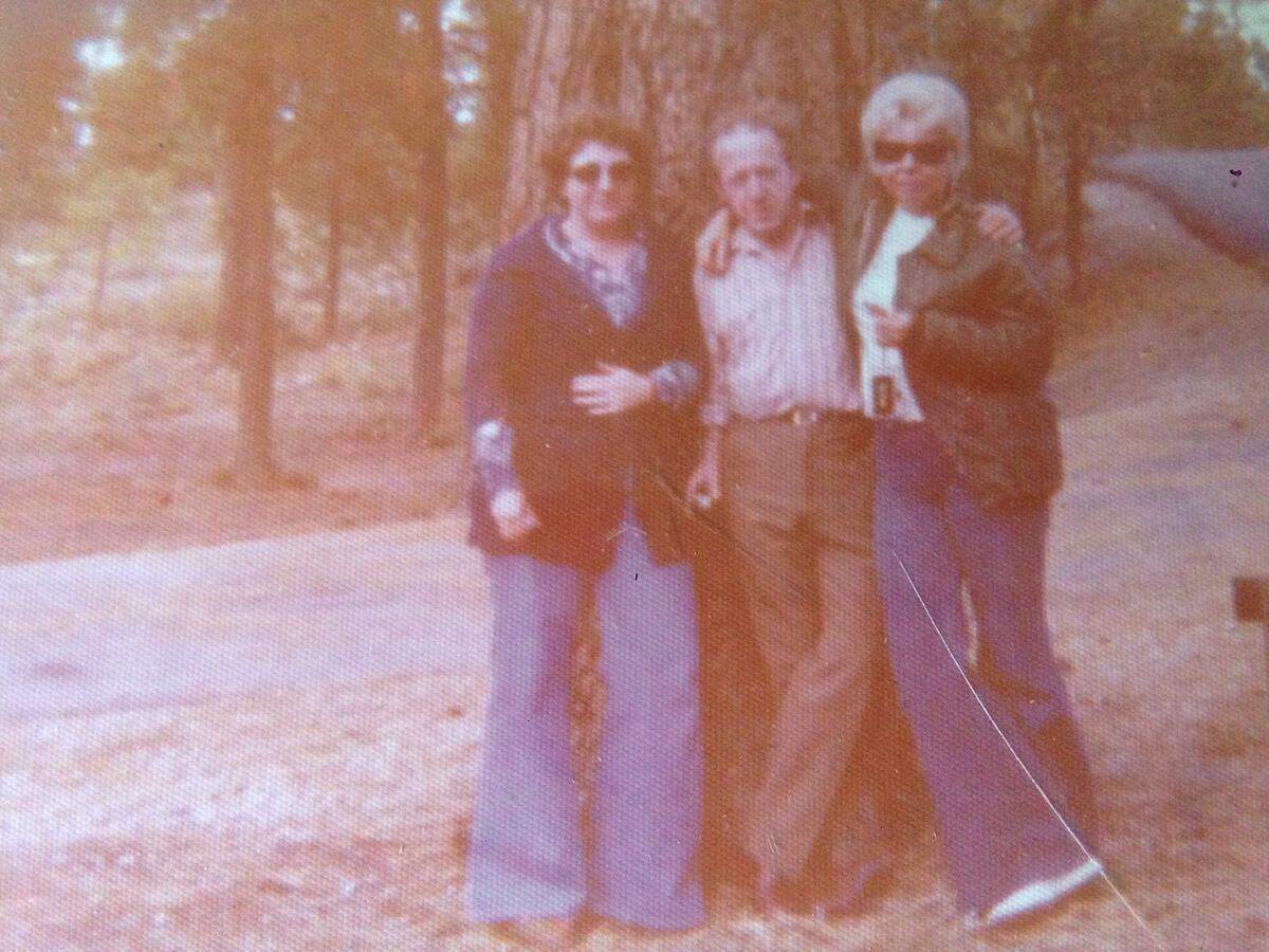 Patricia Dwyer, left, poses for a picture with her uncle and sister in 1976.