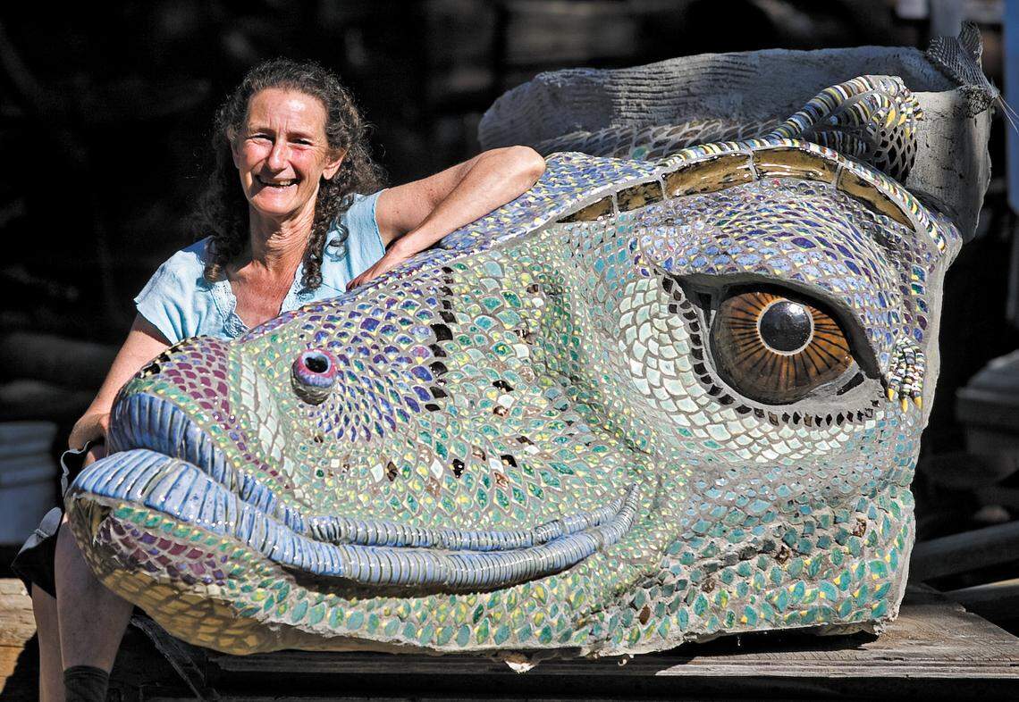 Ceramics artist Phoebe Palmer poses for a picture with one of her creations on Feb. 7, 2011. She lives at the edge of Monterey County just north of Ragged Point.