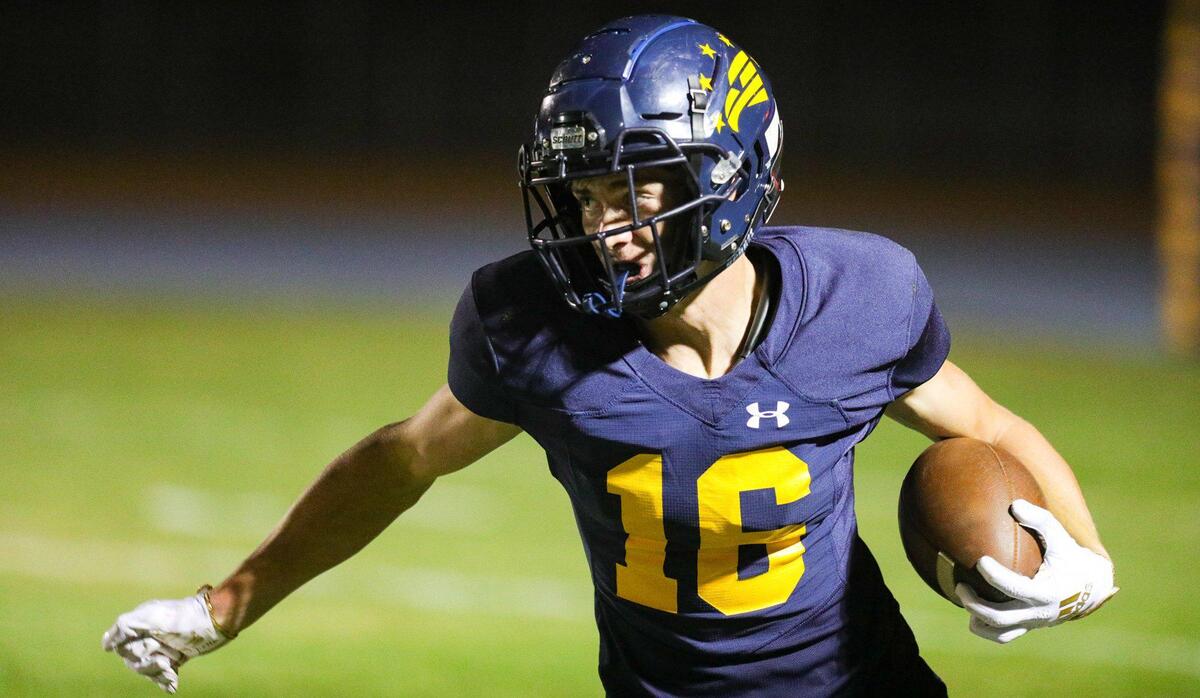 Koa Kopcho runs with the ball in Arroyo Grande’s 42-37 loss to Lompoc in a hard-fought Mountain League football opener on Sept. 16, 2022.