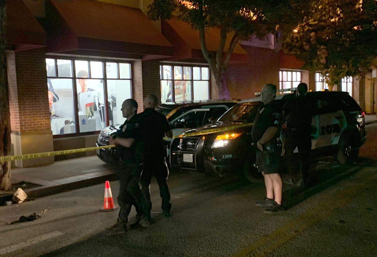 San Luis Obispo police investigate the scene where a 21-year-old man fell from the Marsh Street parking garage on Sept. 14, 2019. The man, Atascadero resident Thomas Jodry, died from his injuries.