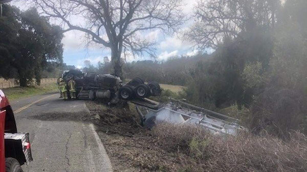 An overturned trailer spilled hazardous materials including limestone powder and diesel fuel onto Chimney Rock Road road in rural San Luis Obispo County on Feb 17, 2025.