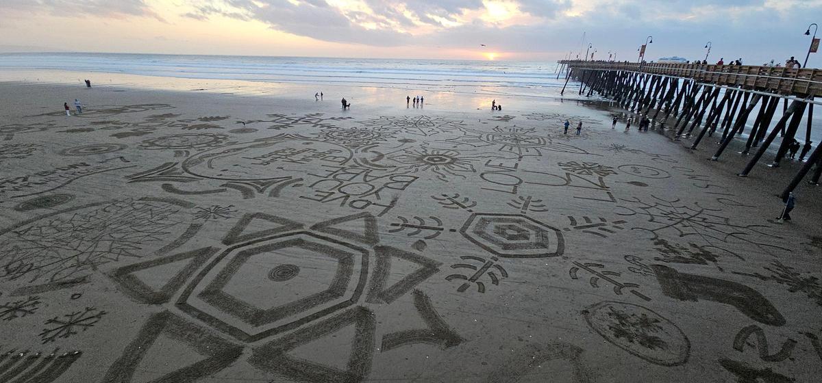 The finished snowflakes. Beachgoers turn Pismo Beach into a seaside winter wonderland at a “Snowflakes on the Sand” event, Saturday, Dec. 14, 2024.
