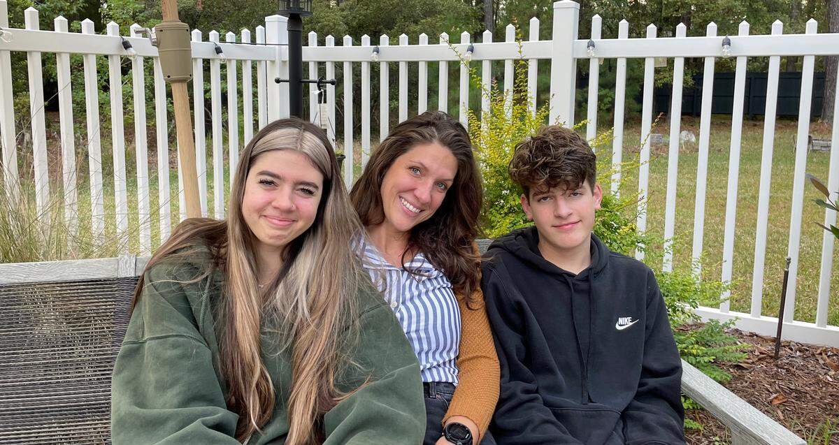 French Hospital nurse Elissa Molfino, center, and her children Gwen, 16, and Gabe Molfino, 14, of San Luis Obispo, wound up dog-sitting a beloved golden retriever belonging to Michael Walsh of Cambria in late October 2022. He’d gone to the emergency room to be checked out after a fall, but didn’t think he’d be admitted to the hospital and was unable to care for the pet waiting for him in the car.