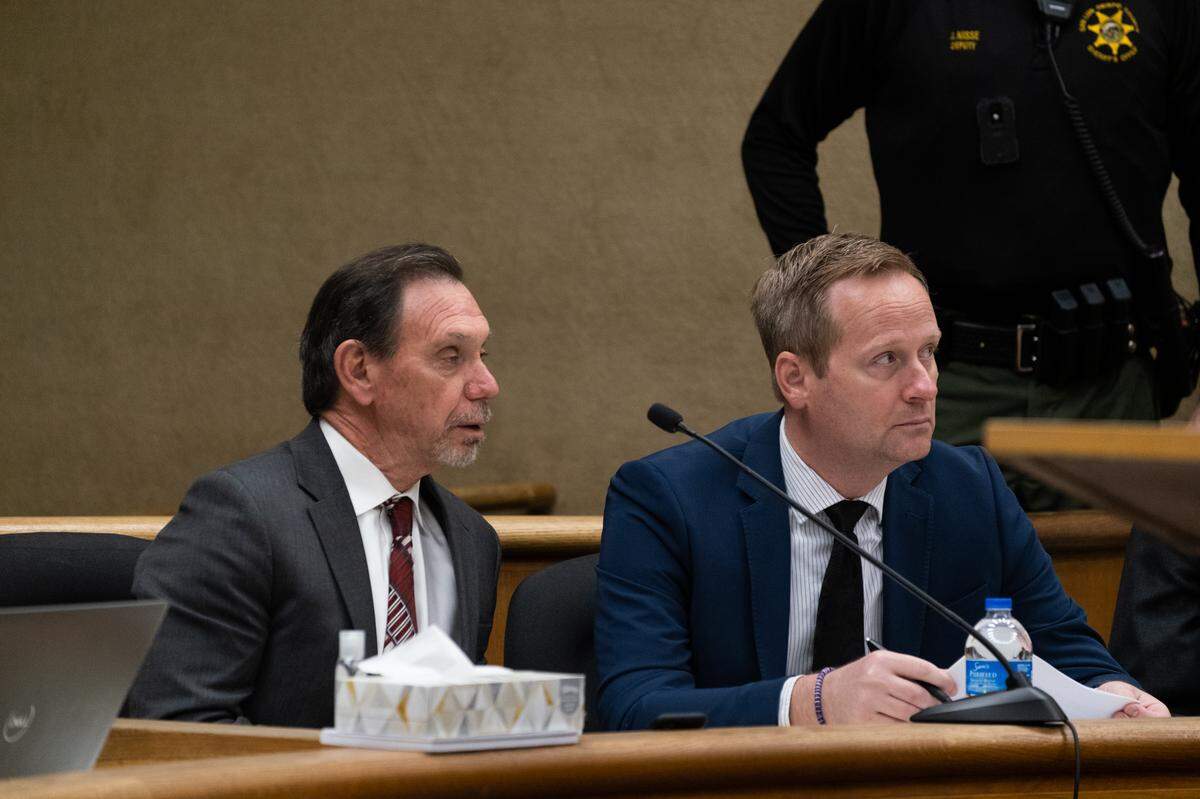 Defense attorneys Ray Allen (left) and Tim Osman listen to closing arguments in the case against their client, Stpehen Deflaun, in San Luis Obispo Superior Court on Apr. 18, 2023.