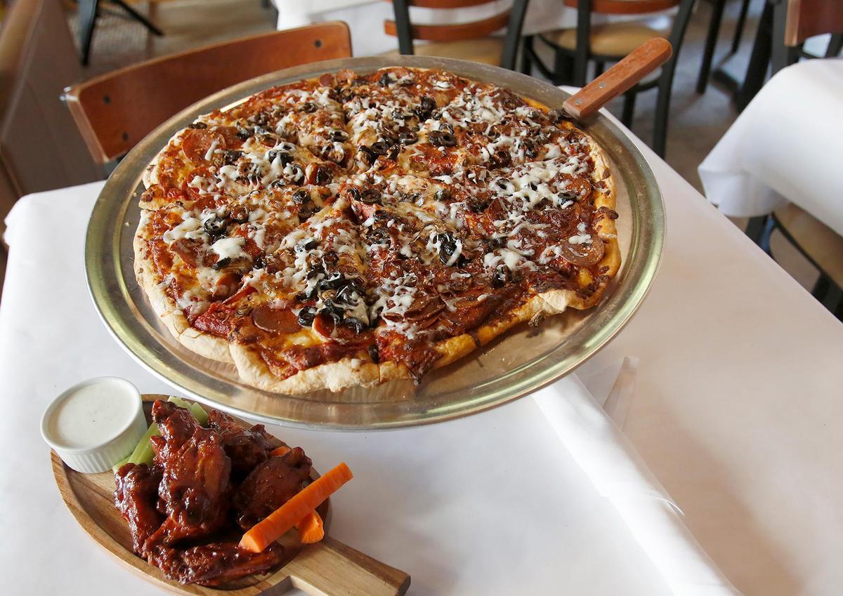 Bob Cantu, the owner of Marv’s Pizza and Sports Bar in Paso Robles, has opened a second restaurant in San Luis Obispo featuring the same menu, including a specialty pizza made with pepperoni, sausage, mushroom, onions, cheese and red sauce and Marv’s Famous Wings.