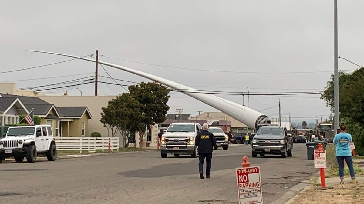 A massive blade for one of 29 wind turbines destined for a site in Miguelito Canyon near Lompoc makes its way through the city.
