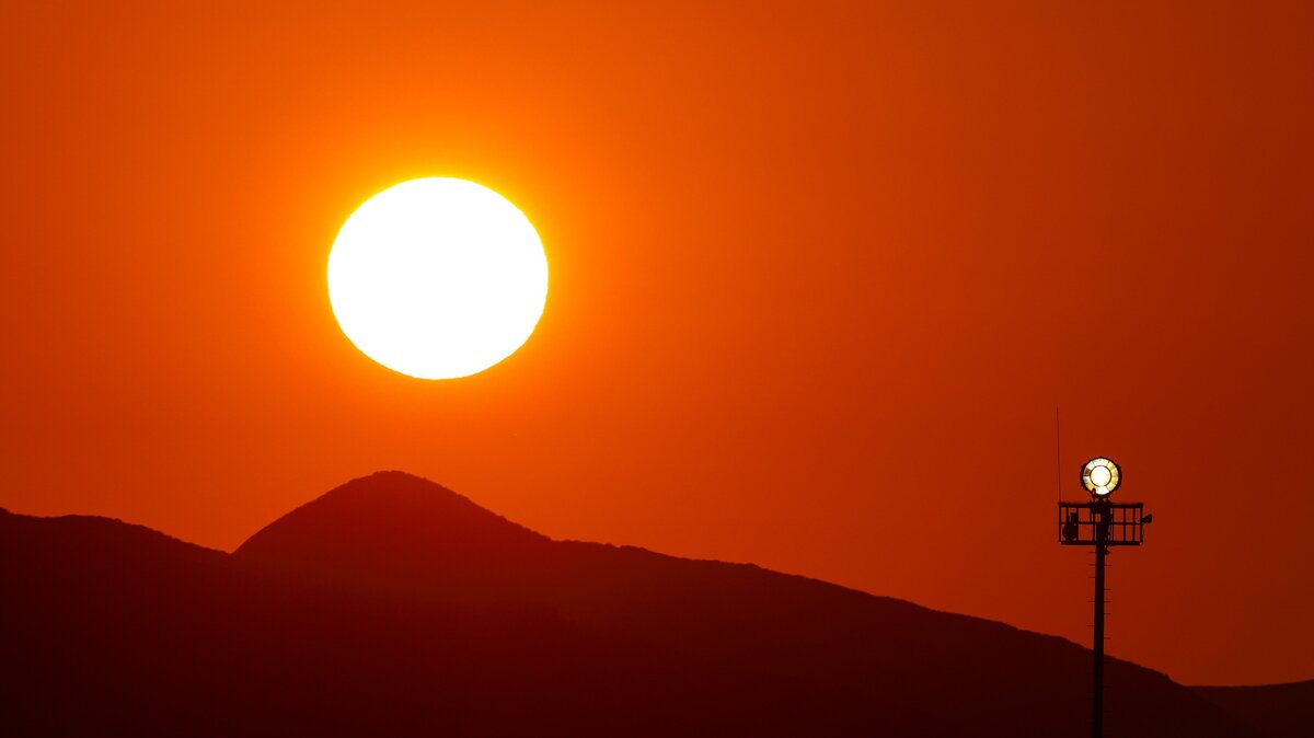 A smoke-filled sunset colored the sky red over San Luis Obispo County Regional Airport and the beacon that marks the facility on Thursday. Large fires burning throughout California have caused hazy, orange skies and poor air quality across the state.