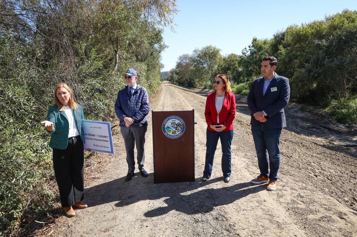 Officials gathered to update the community on repairs to the Arroyo Grande Creek levee in Oceano Oct. 11, 2023. From the left are deputy director SLO County public works, Kate Ballantyne; State Senator John Laird, State Assembly Dawnf Addis, and County Supervisor Jimmy Paulding.