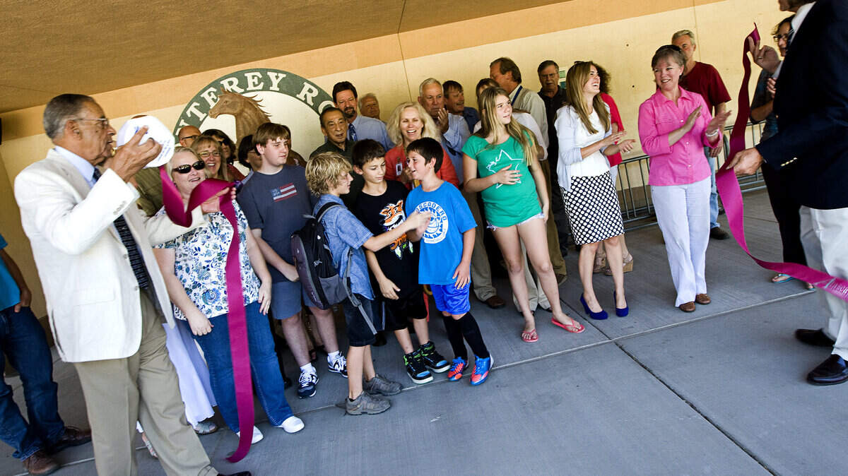 Atascadero officials, teachers and students cheer Thursday, Aug. 29, after a ribbon-cutting ceremony marks the completion of the Monterey Road Elementary School modernization project.