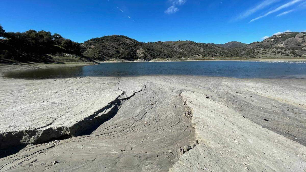 Runoff from the January storm carved gullies in the shores of Lopez Lake. As of Thursday, the lake was at 34.7% capacity.