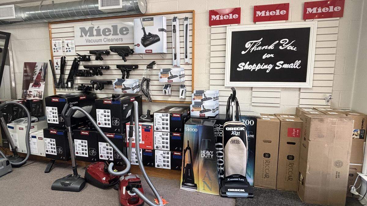 On the left wall of Atascadero Sewing and Vacuum Center, vacuums of all makes and models are displayed.