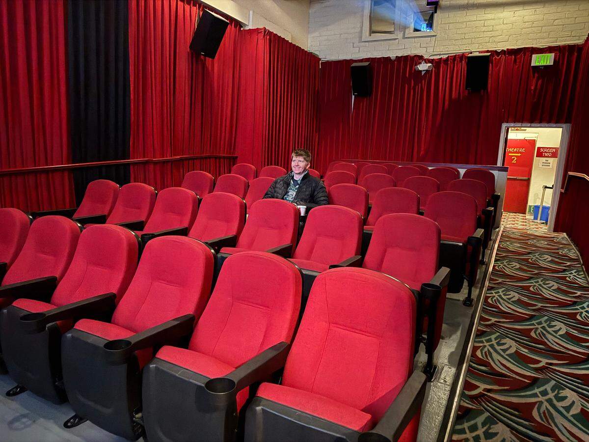 Nigel waits for “Freaky Tales” to start at the Palm Theatre in San Luis Obispo on April 14, 2025.