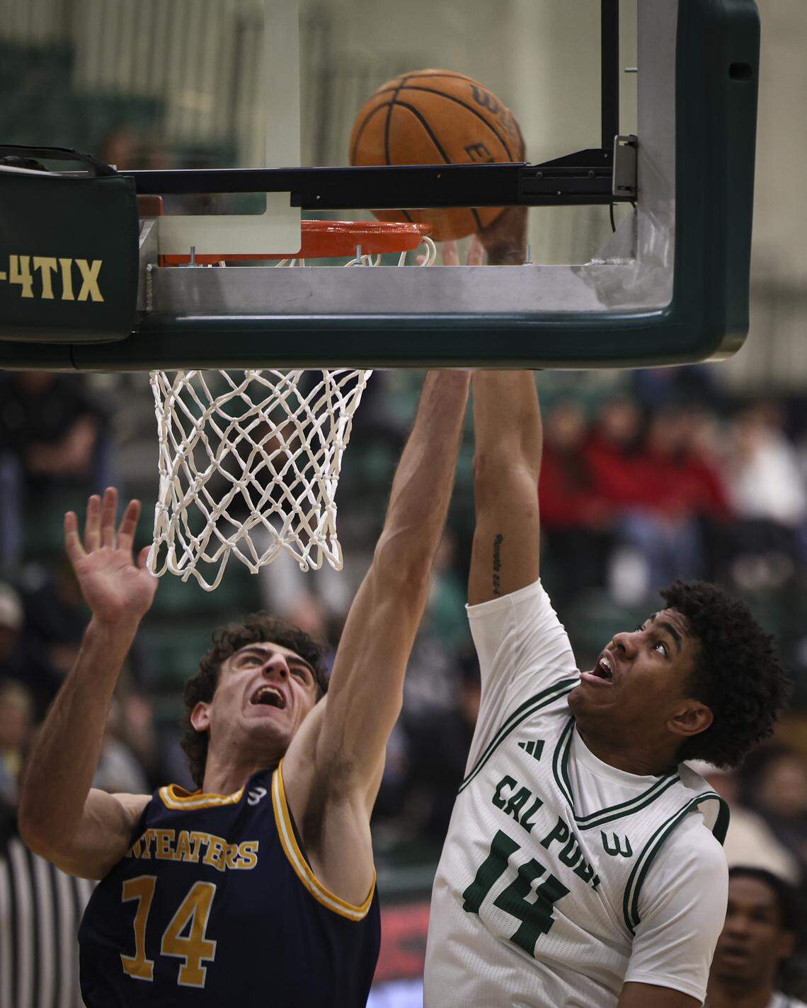 Cayden Ward gets scores past Kyule Evans. Cal Poly men scored an upset basketball victory over U.C. Irvine 79-73 on Feb. 12, 2026.