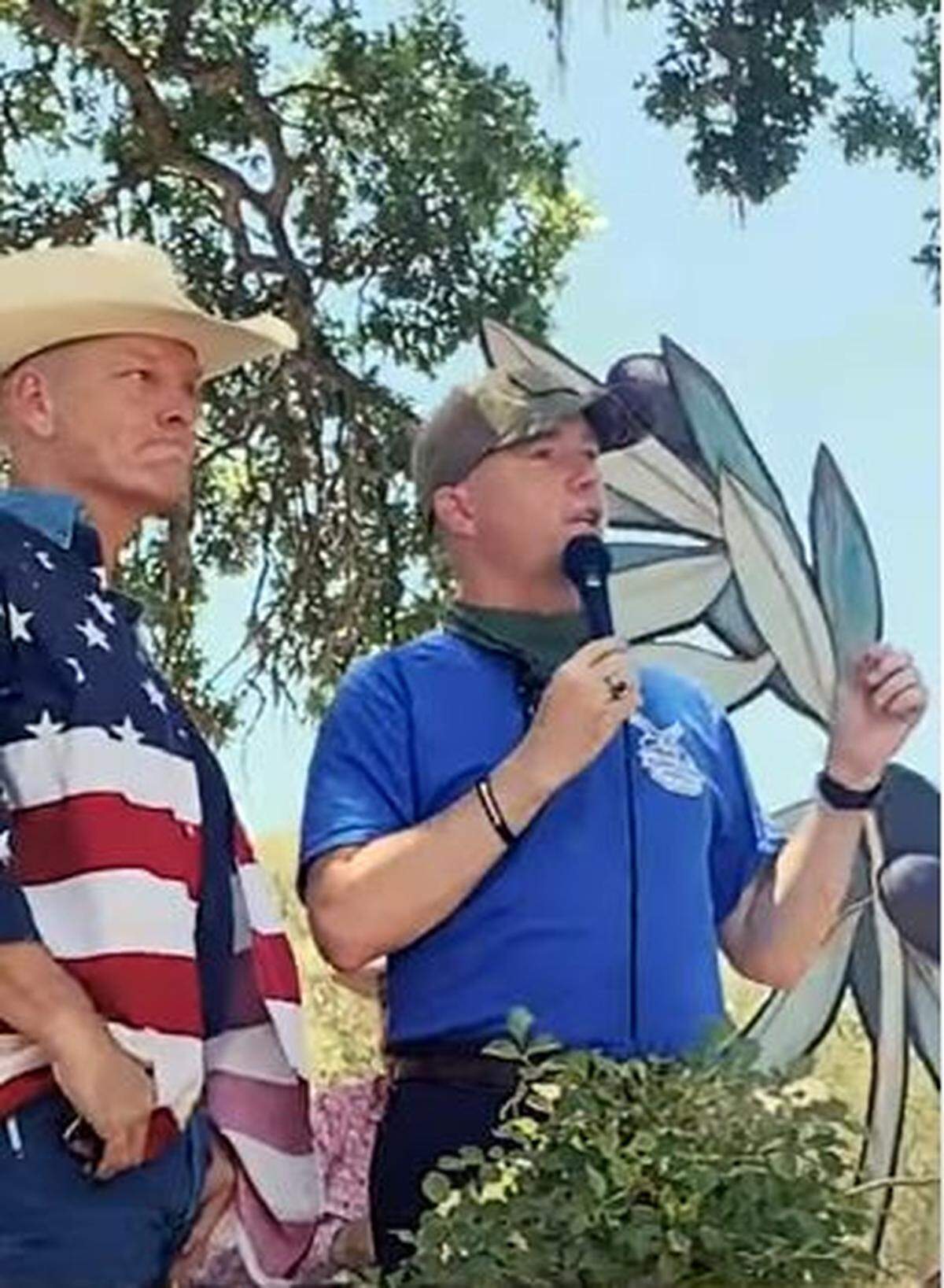 San Luis Obispo County District Attorney Dan Dow speaks at a Fourth of July event at Sculpterra Winery in Paso Robles in which he declares San Luis Obispo County a “sanctuary county for worship and praise in church,” in opposition to statewide mandates restricting indoor church services due to COVID-19. With him is Scott Peterson of the CHP.