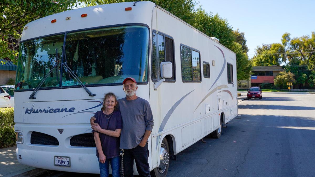 San Luis Obispo residents Lorena Teller and Greg Huckabay have lived in their recreational vehicle in San Luis Obispo County for five years, pictured here Aug. 9, 2024. Huckabay said enforcement by the San Luis Obispo Police Department against unlawful overnight parking has intensified over the course of the year.