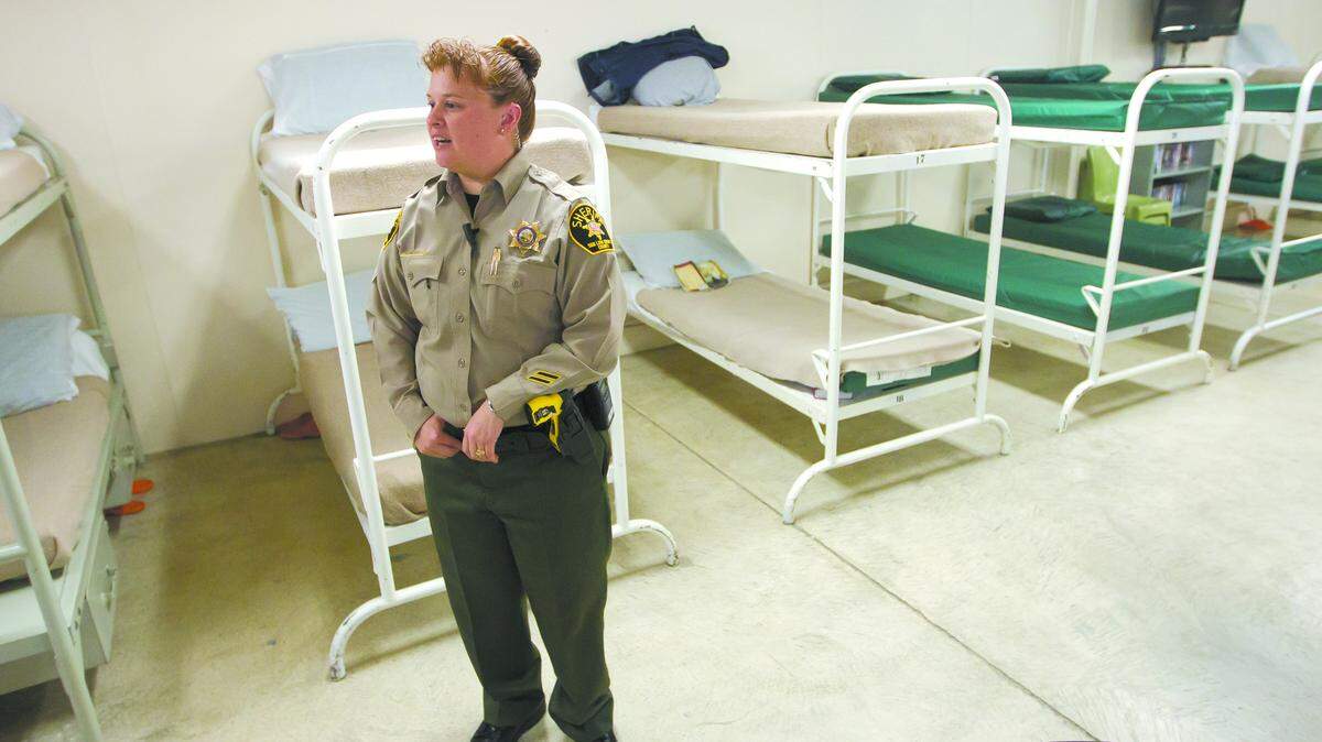 Lacey Silveira of the San Luis Obispo County Sheriff’s Office gives a tour of the women’s honor farm, which uses two modular units next to the County Jail off Highway 1. One unit is outfitted with 28 beds.