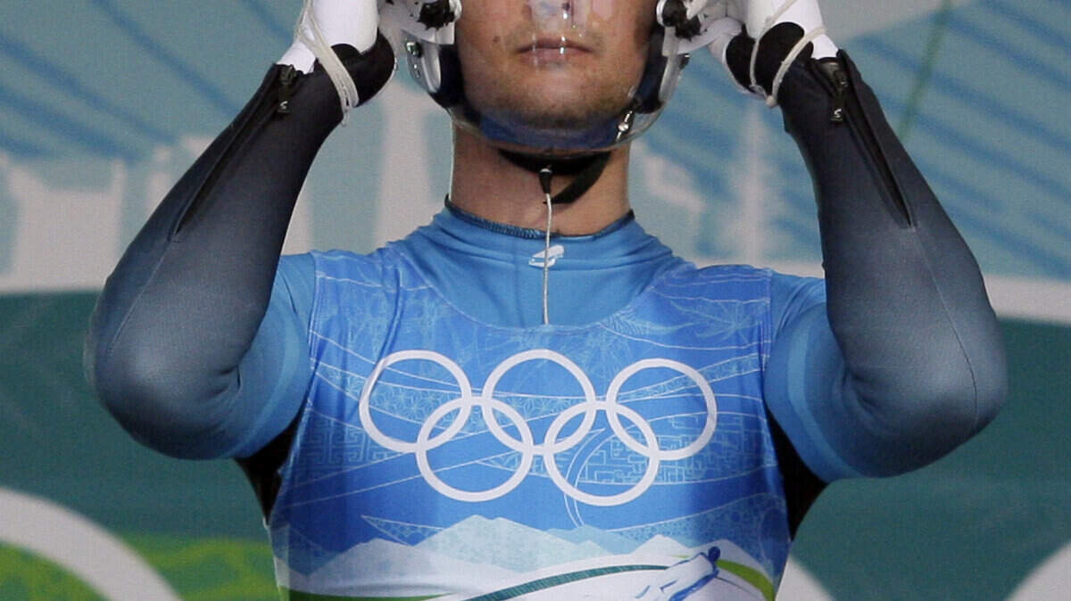 Nodar Kumaritashvili of Georgia is seen at the start of the first training run of the day Friday for the men's singles luge. He crashed during the second run and died at a hospital. (AP Photo/Elise Amendola)