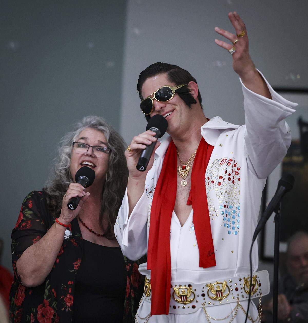 Julie Tacker sings a duet of “I Can't Help Falling in Love” with Elvis at Creston Village, an assisted living community in Paso Robles to celebrate Valentine's Day on Feb. 12, 2026. The King sang some of his hits and passed out red roses to residents. He has a remarkable resemblance to Adam Bramwell, the Executive Director of the facility.