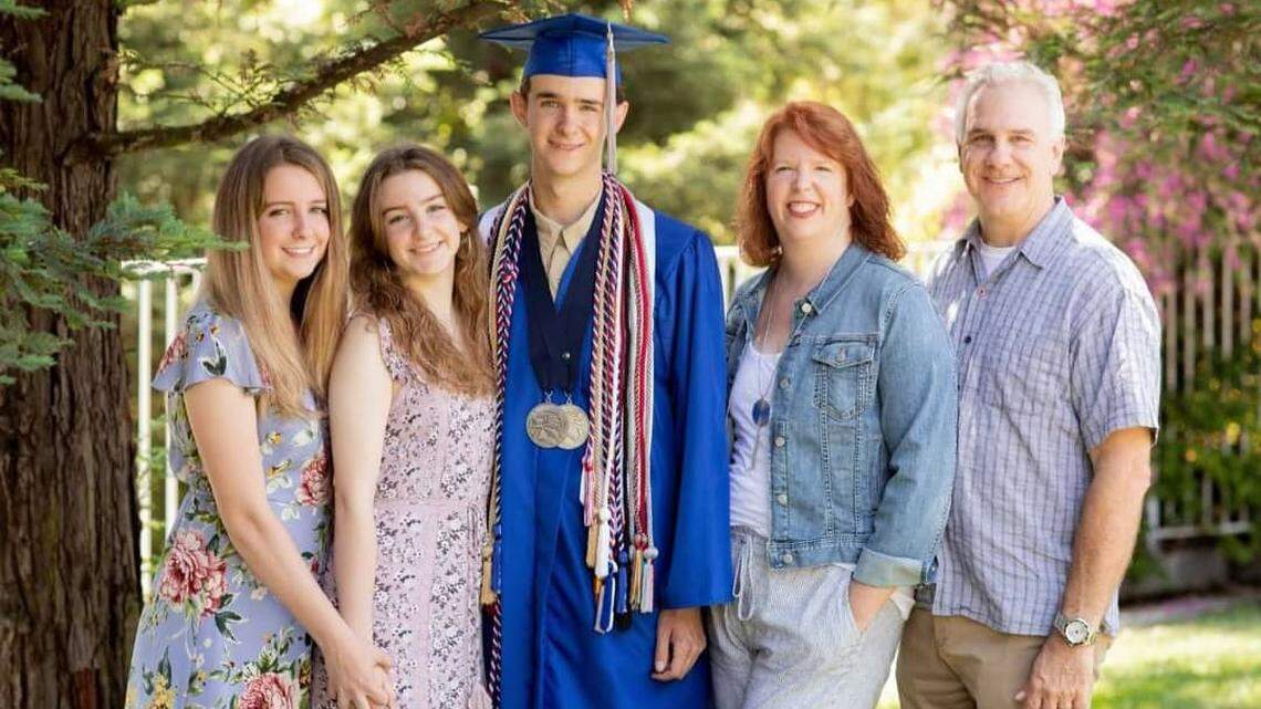 Noah DeVico, center, poses for a picture with his two sisters, Morgan, far left, and Grace, and his parents, Keary and Jeff. DeVico died Tuesday after a motorized skateboard accident on Cal Poly’s campus in San Luis Obispo, California.