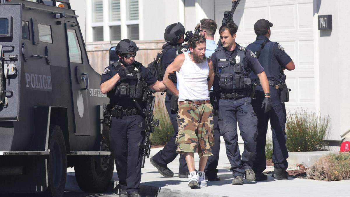 San Luis Obispo police arrest a shooting suspect at a home on Legacy Lane in San Luis Obispo on Thursday, Aug. 17, 2023. The man was suspected of shooting a 7-11 convenience store employee in Grover Beach and firing shots at the Panda Express restaurant near Costco.