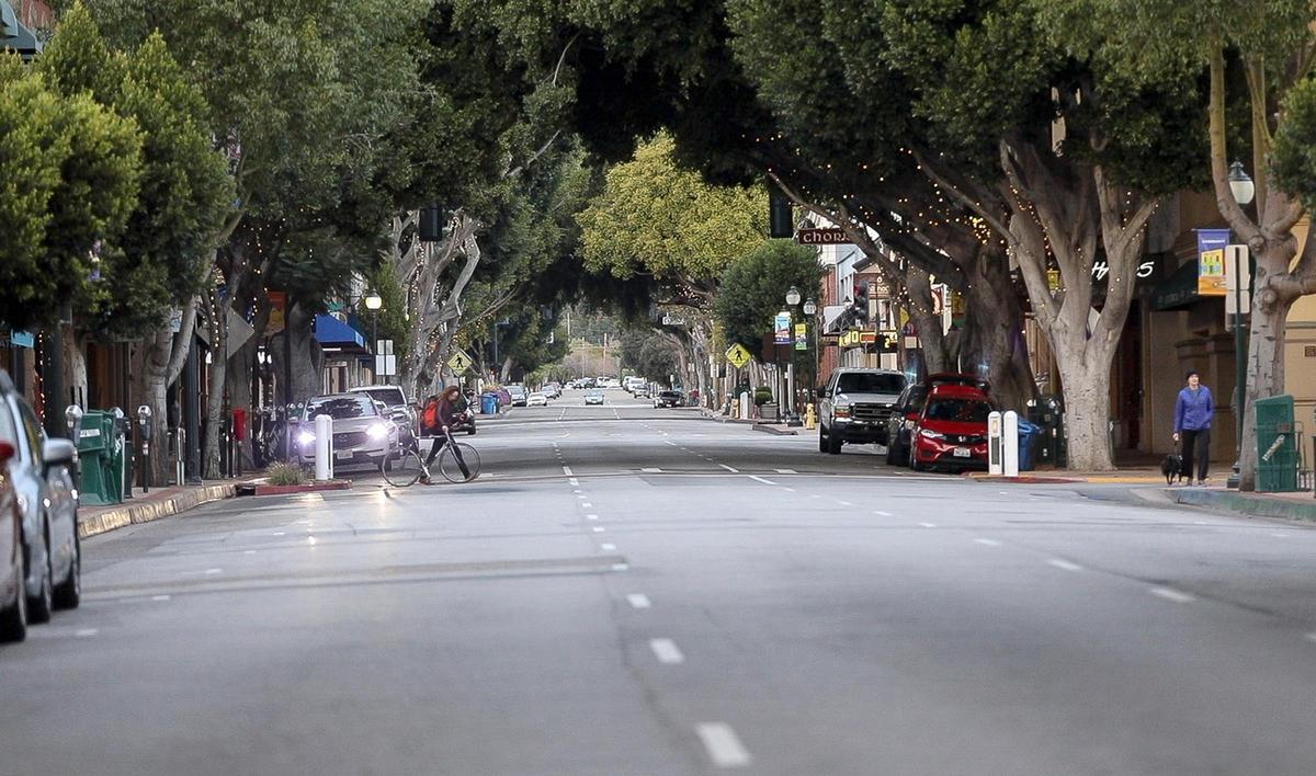 The usually busy streets in downtown San Luis Obispo were virtually empty Thursday night after the county’s shelter-at-home order went into effect at 5 p.m. This is Higuera Street at Broad Street at 6:30 p.m. when Farmers Market normally would be happening.
