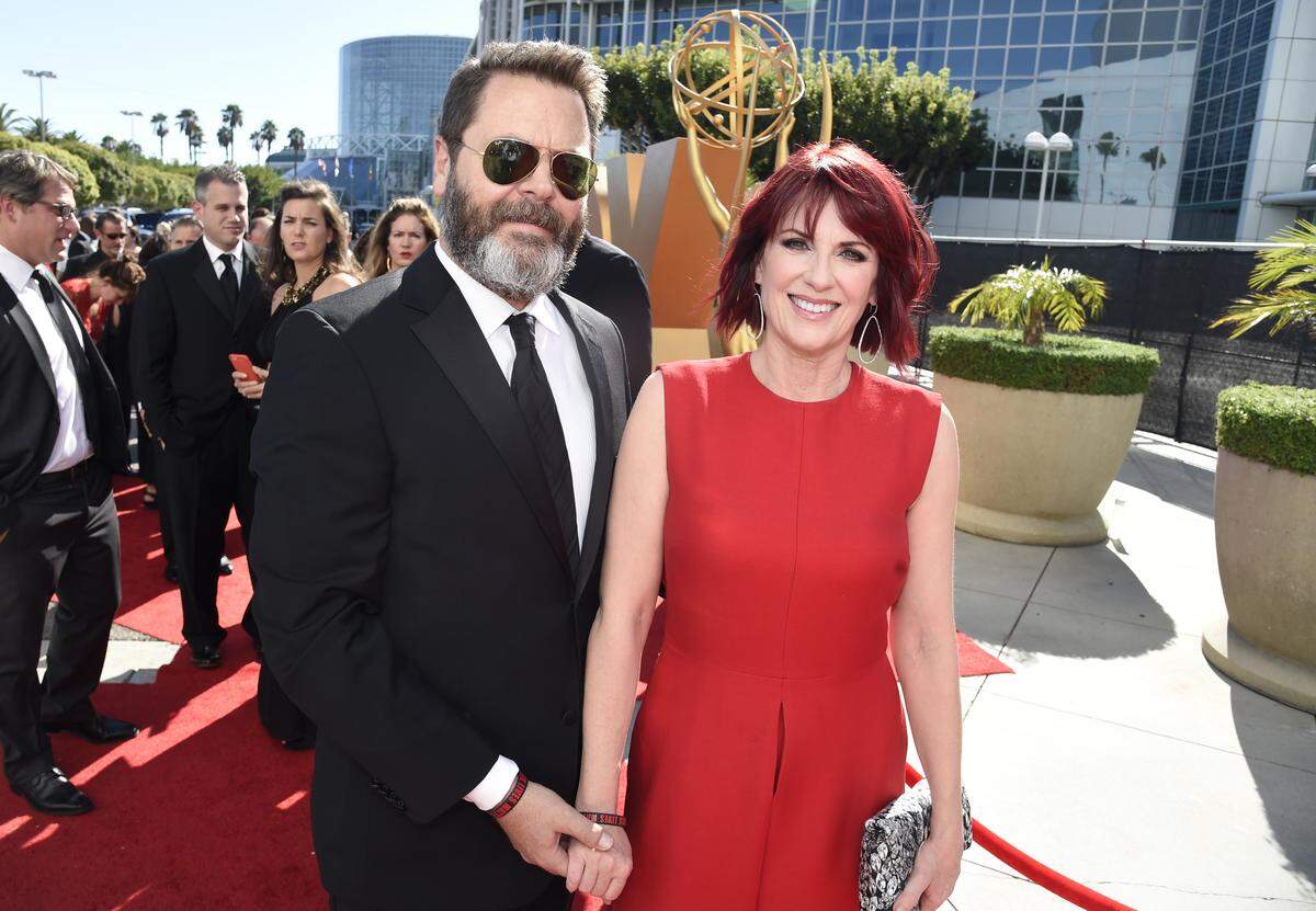 Nick Offerman, left, and Megan Mullally arrive at the 67th Primetime Emmy Awards in 2015 at the Microsoft Theater in Los Angeles.