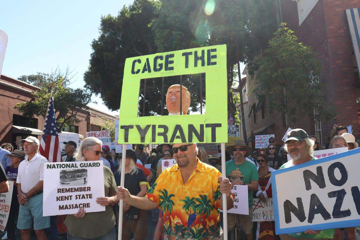 Thousands of people attended the No Kings rally in downtown San Luis Obispo to protest the Trump administration and support Prop. 50 on Oct. 18, 2025.
