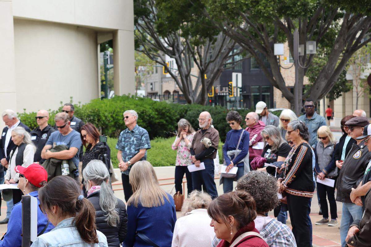 Over a hundred people gathered on the steps of the San Luis Obispo Superior Courthouse to celebrate the National Day of Prayer on Thursday, May 1, 2025, an event led by District Attorney Dan Dow.
