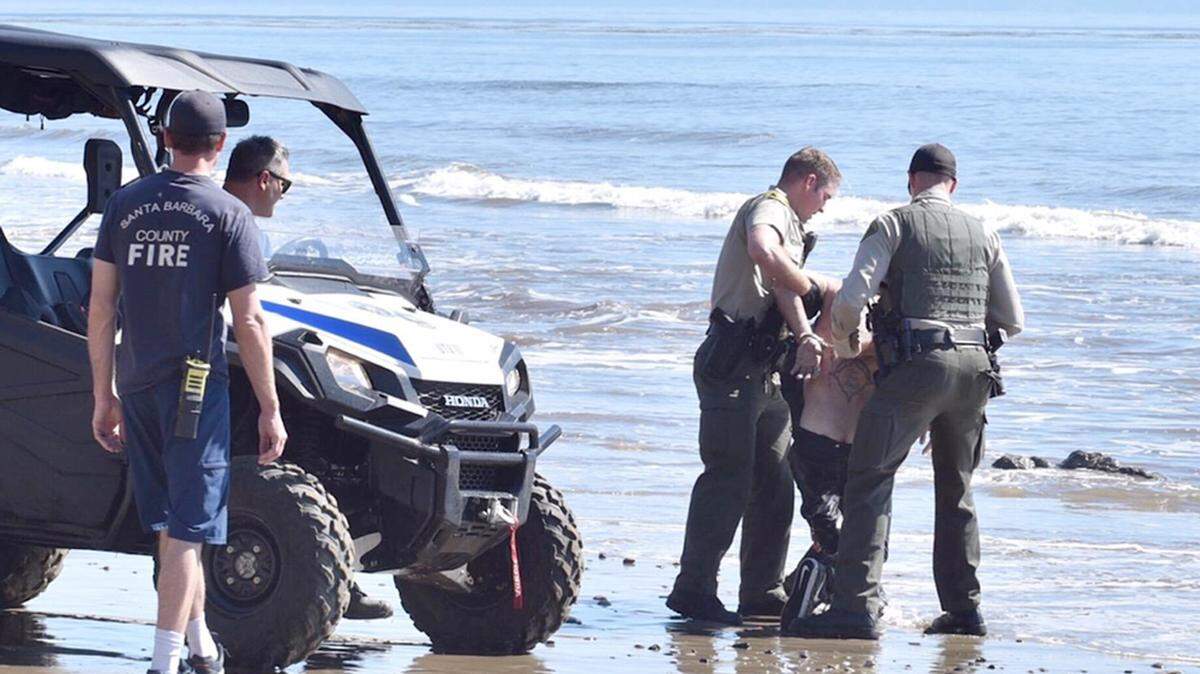 Firefighters were called out Saturday afternoon to rescue a man who attempted to elude pursuing sheriff’s deputies by swimming out into the ocean near Sandpiper Golf Course in Goleta.