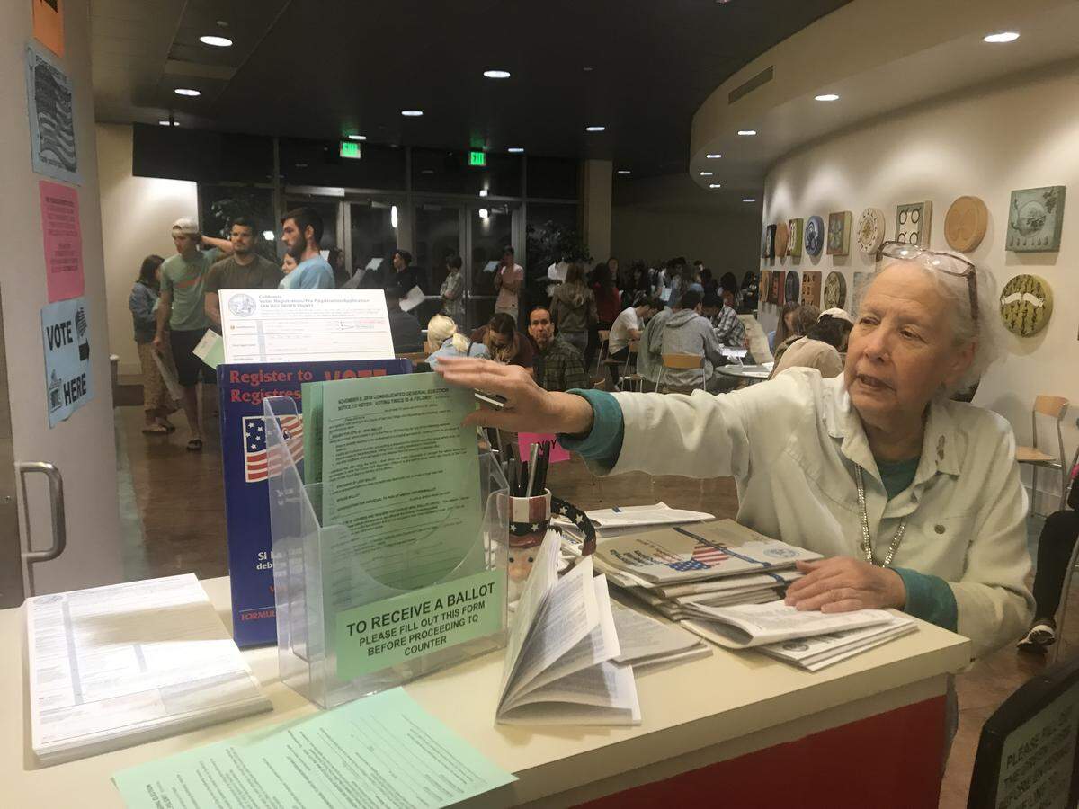 Precinct worker Jayne Sacks helped dozens of last-minute young voters in San Luis Obispo County, many using California’s conditional registration and provisional ballot process.