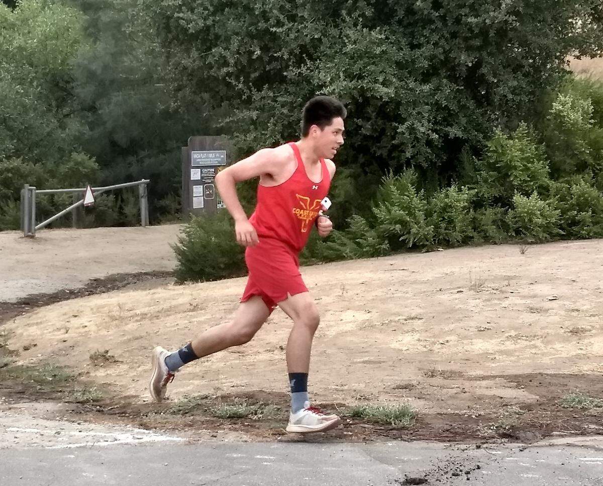 Alex Becceril turns a corner for Coast Union’s cross country team Saturday, Sept. 28, in Atascadero during the Brug Invitational.