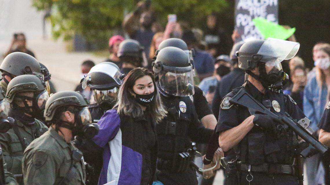 A Black Lives Matter protester is taken into custody near the San Luis Obispo police station on June 1.