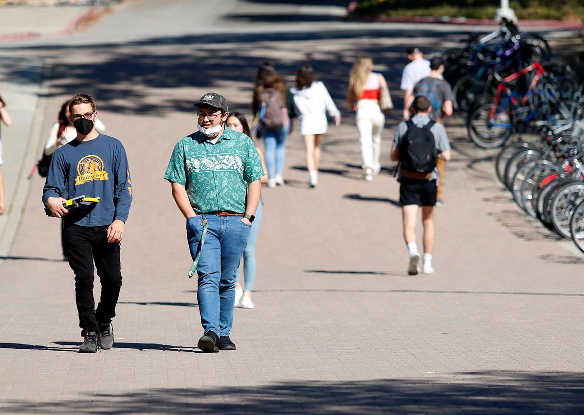 Students walk to and from classes at Cal Poly on a January afternoon. The school is the whitest public university in California.