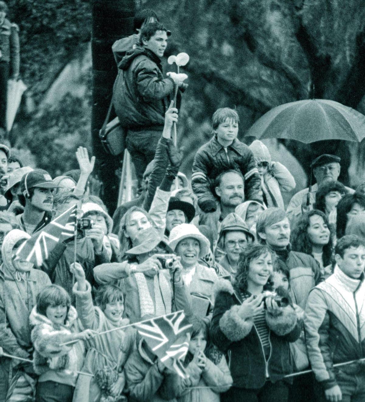 The crowd presses forward for a glimpse of Queen Elizabeth II and Prince Philip at Mission Santa Barbara on March 1, 1983.