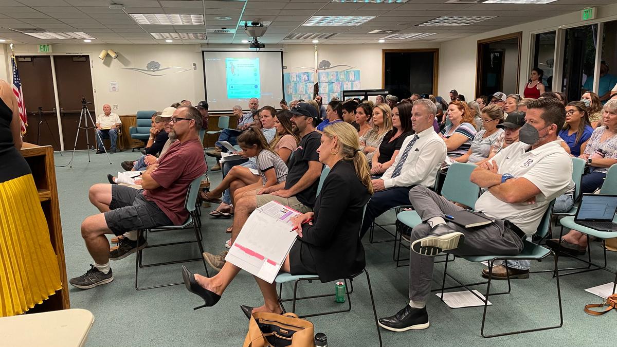Members of the public listen to the Paso Robles Joint Unified School District Board of Trustees meeting on Tuesday, Aug. 10, 2021.