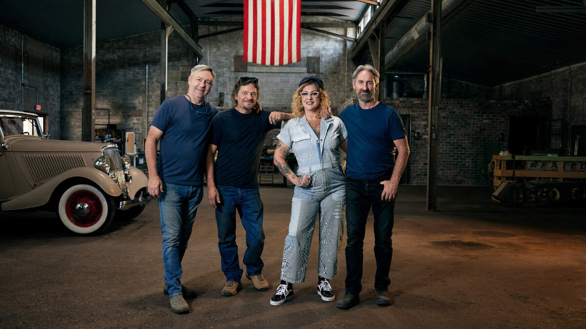 From left to right, “American Pickers” cast members Robbie Wolfe, Jersey Jon, Danielle Colby and Mike Wolfe pose for a picture.