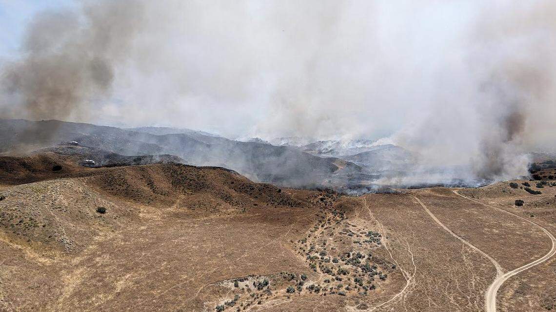 A fire burns southeast of New Cuyama and the intersection of Kirschenmenn Road and Foothill Road in Santa Barbara County on May 28, 2024. An evacuation warning was issued for nearby residents.