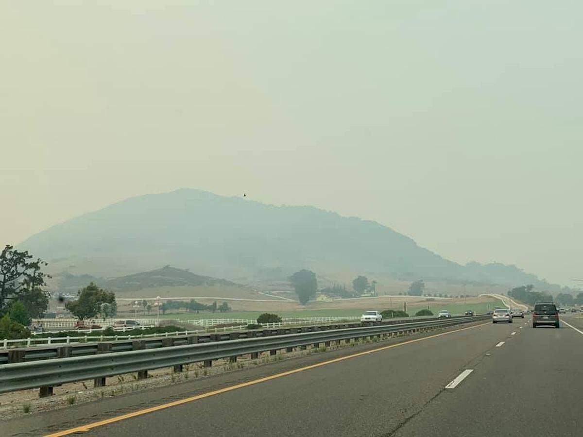 Haze covers Cerro San Luis Obispo, as seen from Highway 101 on Wednesday, Aug. 19, 2020.